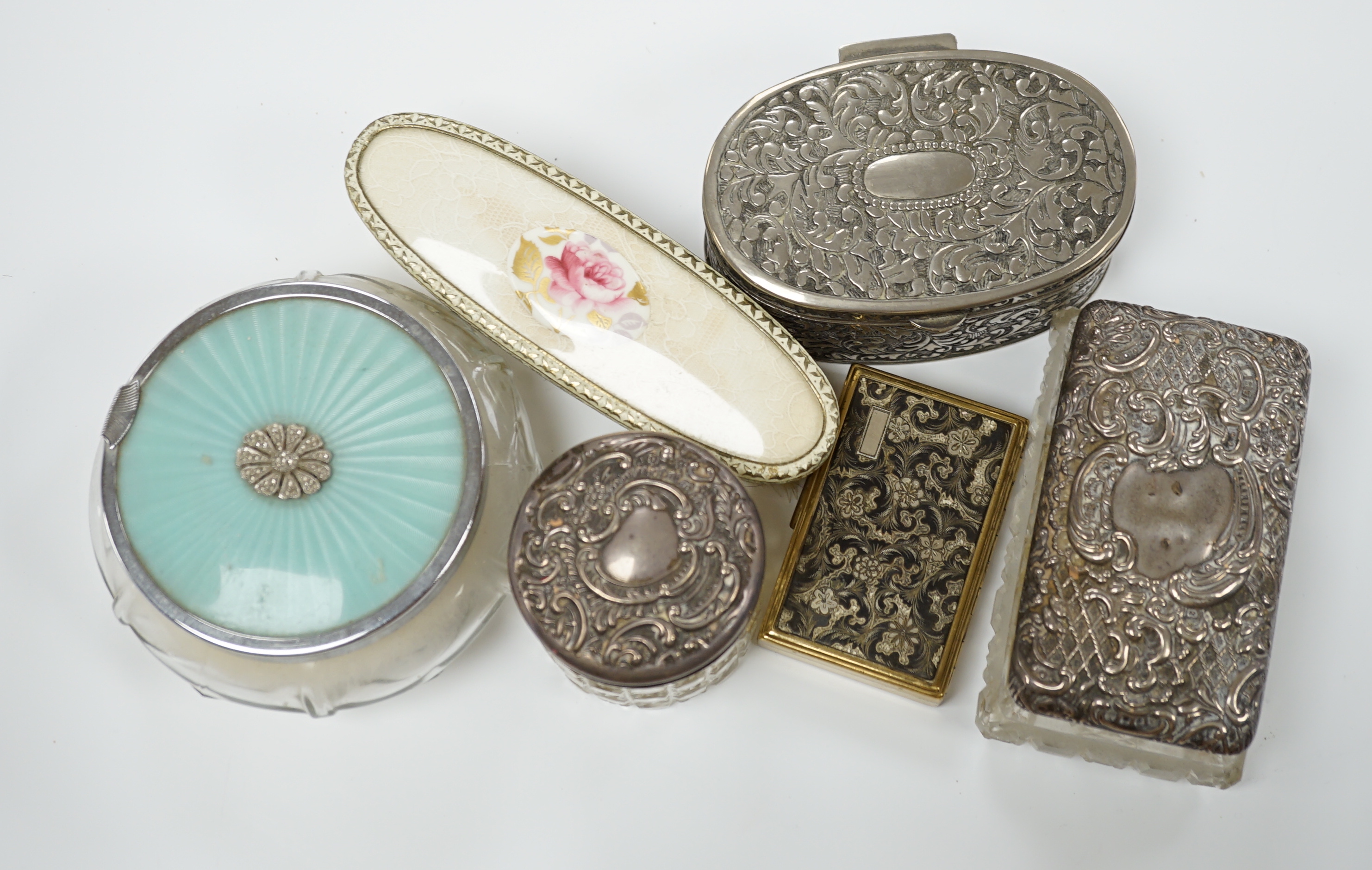 An Edwardian silver mounted cut glass scent bottle, Birmingham, 1902, seven other silver mounted dressing table items and four other items.